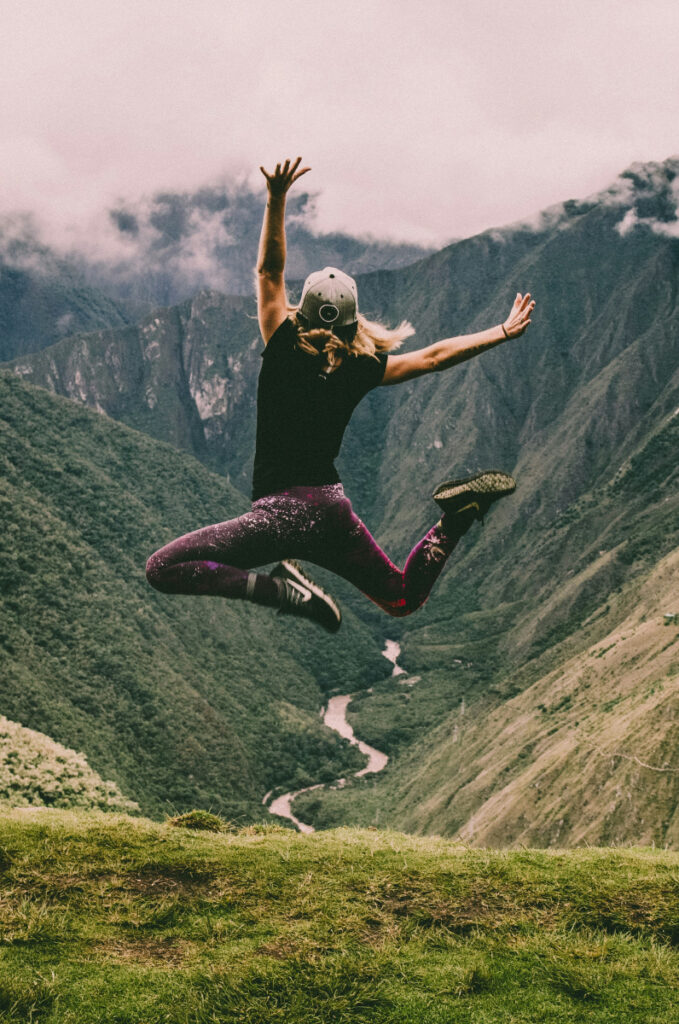 This woman jumping for joy demonstrates her state of health and fitness.